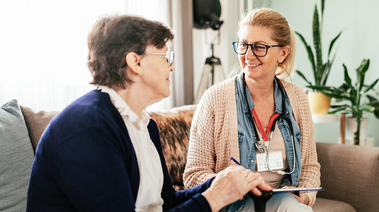 Nurse speaking with patient