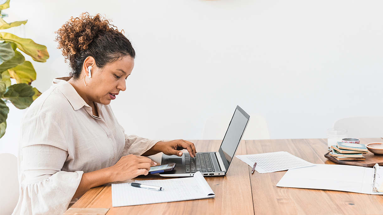 Woman paying bills on computer